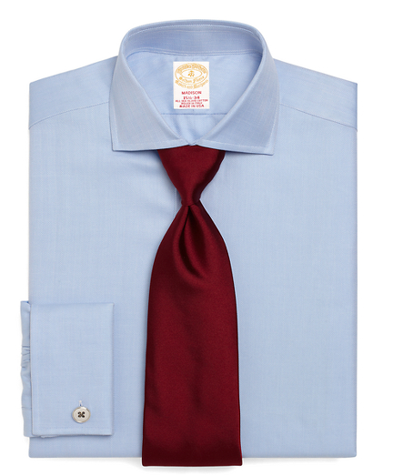 Made from one of the rarest cotton varieties distinguished by its purity and strength. Sea Island cotton has the softness of cashmere and the luster of silk. Fabric is spun in Switzerland and woven in Italy. English collar, French cuff. Natural shell buttons. Machine wash. Made in the USA. Cuff links not included.