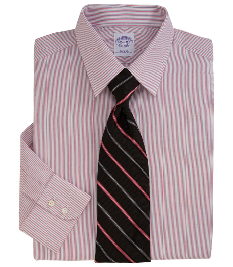 Pure cotton woven in Italy. Tennis collar. French placket, split-back yoke and double-button barrel cuffs. Machine wash. Made in the USA.