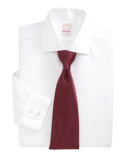 Pure Egyptian cotton, specially treated to remain virtually wrinkle-free. French placket and split-back yoke. English collar. Double-button barrel cuffs. Single-needle tailoring and superdurable buttons. Regular fit. Machine wash. Imported.