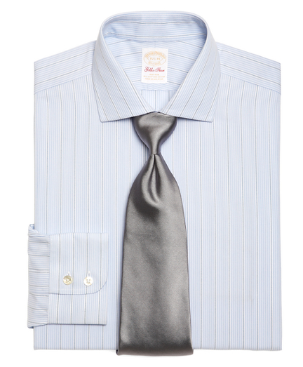 Pure Egyptian cotton, specially treated to remain virtually wrinkle-free. French placket and split-back yoke. English collar, double-button barrel cuffs. Single-needle tailoring and superdurable buttons. Machine wash. Imported.