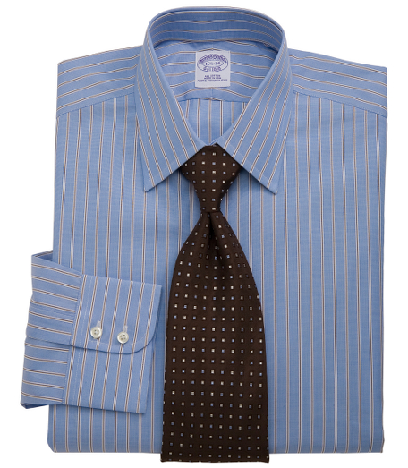 Pure Egyptian cotton woven in Italy. Tennis collar. Signature shirring at double barrel cuffs. French placket and chevroned split back yoke. Machine wash. Made in the USA.