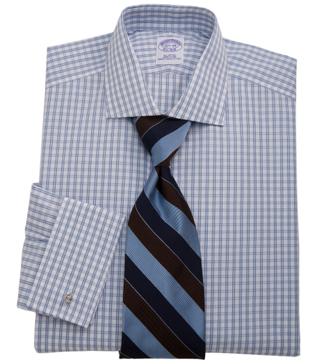 Pure Egyptian cotton woven in Italy. English collar. Signature shirring at French cuffs. French placket and chevroned split back yoke. Machine wash. Made in the USA. Cuff links not included.