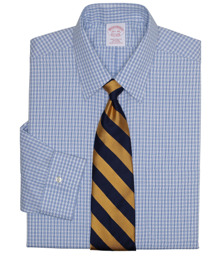 Pure pinpoint cotton treated to remain virtually wrinkle-free. Pucker-free seams. Center back pleat and signature shirring at barrel cuffs. Forward point collar. Left chest pocket. Machine wash. Imported. Also available in Slim fit.