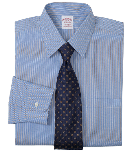 Pure pinpoint cotton made with pucker-free seams and specially treated to remain virtually wrinkle-free. Forward point collar. Signature shirring at barrel cuffs. Center back pleat. Left chest pocket. Machine wash. Imported. Also available in Slim fit.