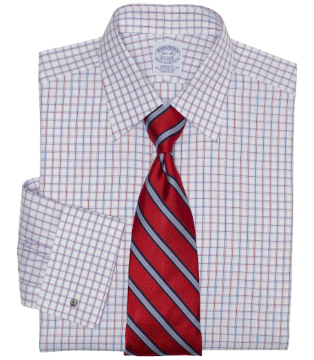 Pure Egyptian cotton woven in Italy. French front placket and chevron split-back yoke. Tennis collar. Signature shirring at French cuffs. Machine wash. Made in the USA. Cuff links not included.