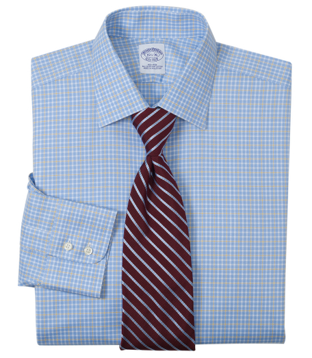 Pure Egyptian cotton made with pucker-free seams and specially treated to remain virtually wrinkle-free. French front placket and chevron split-back yoke. Ainsley collar. Signature shirring at double-button barrel cuffs. Machine wash. Imported.