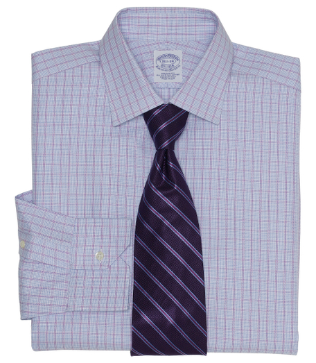 Pure Egyptian cotton woven in Italy. Ainsley collar. Signature shirring at mitered cuffs. French placket and chevroned split back yoke. Machine wash. Made in the USA.