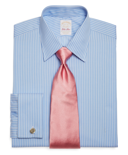 Pure Egyptian cotton woven in Italy. French placket and chevron split-back yoke. Tennis collar and signature shirring at French cuffs. Mother-of-pearl buttons. Machine wash. Made in the USA. Cuff links not included.