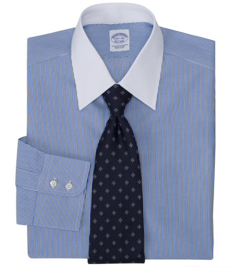 Pure Egyptian cotton woven in Italy. White tennis collar. Signature shirring at double barrel cuffs. French placket and chevroned split back yoke. Machine wash. Made in the USA.