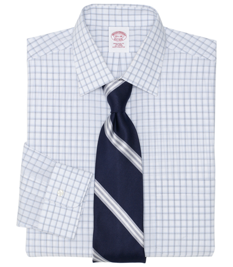 Pure cotton broadcloth made with pucker-free seams and specially treated to remain virtually wrinkle-free. Ainsley collar. Signature shirring at barrel cuffs. Center back pleat. Left chest pocket. Machine wash. Imported. Also available in Slim fit.