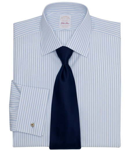 Made from one of the rarest cotton varieties distinguished by its purity and strength. Sea Island cotton has the softness of cashmere and the luster of silk. Fabric is spun in Switzerland and woven in Italy. French placket and split-back yoke. Hamilton collar. Signature shirring at French cuffs. Single-needle tailoring and genuine mother-of-pearl buttons. Regular fit. Machine wash. Made in the USA. Cuff links not included.