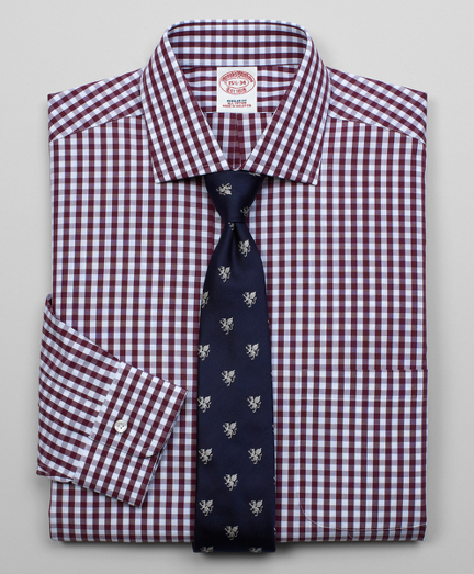 Pure cotton broadcloth. English collar. Signature shirring at barrel cuffs. Center back pleat. Left chest pocket. Single-needle tailoring. Super durable cross-stitched buttons. Machine wash. Imported. Also available in Extra-Slim fit.