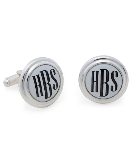 Handpainted with black block-style initials. Sterling silver, t-back. Your last initial will be located in the center of the handpainted monogram. Presented in a gift box. Made in the USA. Please allow an additional three weeks for delivery.