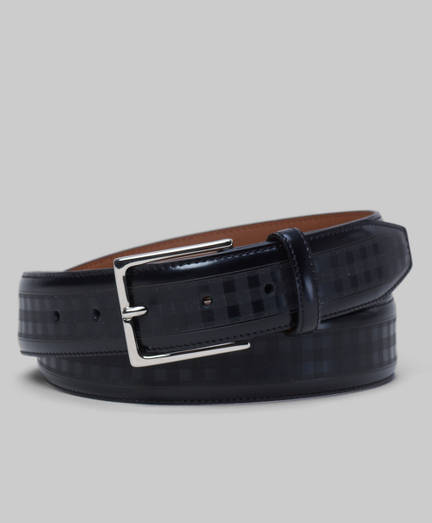 Genuine leather. Silver buckle. 1 1/2" width. Imported.