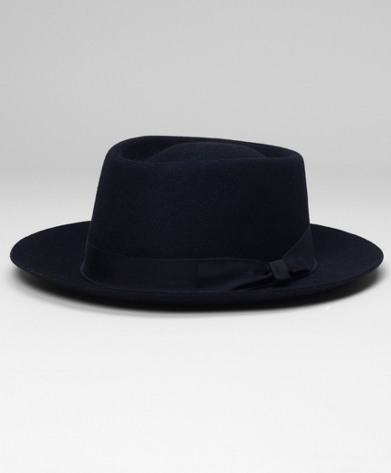 Genuine felted rabbit fur crown with ribbon detail. 2 1/4" brim. Dry clean. Made in Italy.