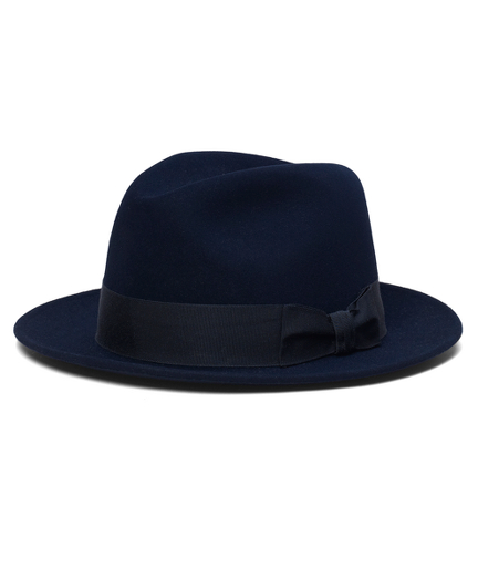 Genuine felted rabbit fur with silk lining and ribbon detail. 2" brim. Dry clean. Made in the USA.