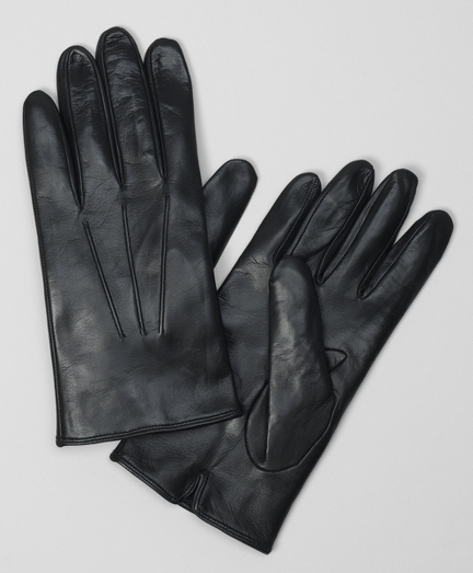 Genuine lambskin with a pique stitched silk lining. Professionally clean. Made in Italy.