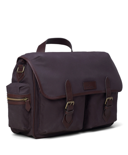 Pure cotton with calfskin trim. Brass hardware and polyester navy twill lining. 16" x 5" x 11". Imported.