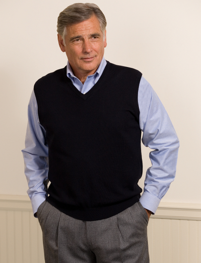 Extrafine Italian merino.  Classic v-neck vest body. Fully fashioned. Dry clean. Imported.