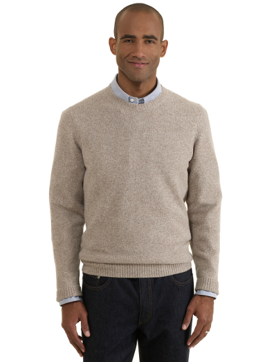 Pure Scottish lambswool. Classic crewneck body. Fully fashioned. Dry clean. Imported.