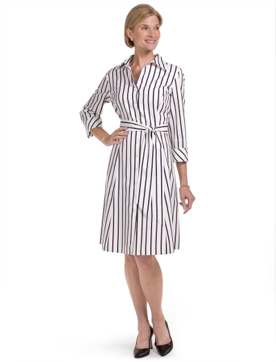 Cotton/silk.  Mother-of-pearl buttons. Fully lined in cotton voile. Three-quarter cuffed sleeves. Self fabric belt at waist. Dry clean. Imported.