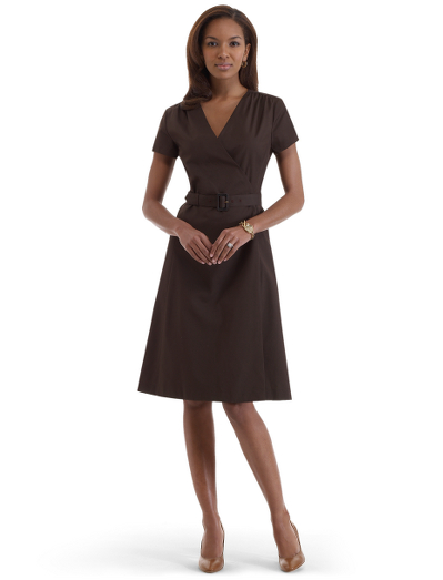Cotton/silk. Mother-of-pearl buttons. Button waist closure at inside and outer wrap. Front pockets.Shirring detail at shoulders. Self covered belt at waist with faux horn buckle. 41" length. Dry clean. Imported. Also available in Petites.