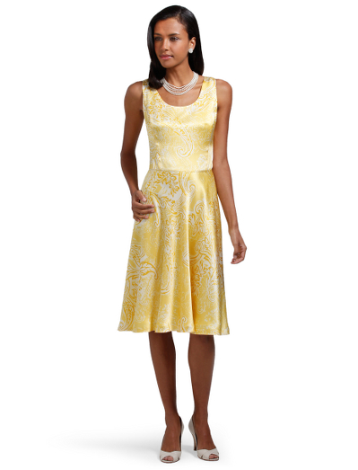 Italian silk. Back zip. Fully lined in silk. Ballet scoop neck. 38" length. Dry clean. Imported.