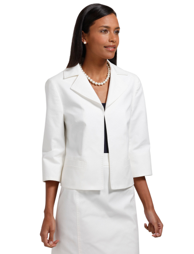 Cotton/lycra. Fully lined in Bemberg. Small covered hook and eye closure at front. Three-quarter sleeves with slits at cuff. Peak lapel with pickstitch detail. Front welt pockets. Bust darts. Back princess seams. 21" center back length. Dry clean. Fabric woven in Italy. Imported.