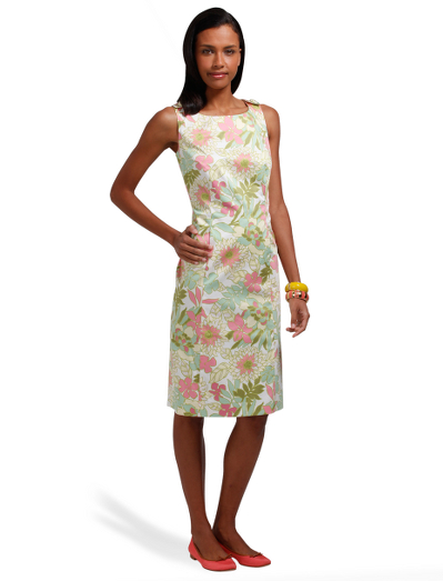 Cotton/elastic. Plain front. Covered buttons. Back zip. Fully lined. 41" length. Machine wash. Imported.