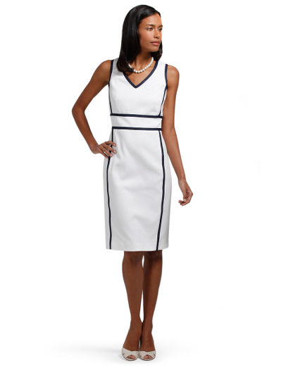 Cotton/viscose. Navy grosgrain trim. Back zip. Fully lined in Bemberg. 39" length. Fabric woven in Italy. Dry clean. Imported.