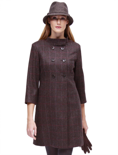 Double-breasted closure with horn buttons.  Three-quarter length.  Mockneck collar and empire waist seam.  Fully lined in Bemberg.  Front-slant pockets.  33" center back length.  Fabric woven in the UK by Robert Noble.  Dry clean.  Imported.