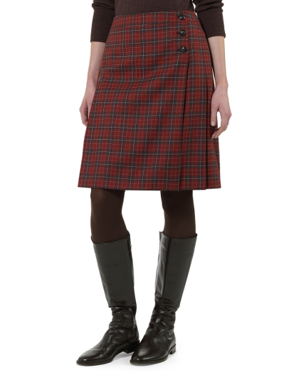 Wool. Plain front. Wrap closure with hidden hook  and bar at inside waist. Three-button closure at outside clap. Fully lined in Bemberg. 22" length.  Dry clean.  Imported.