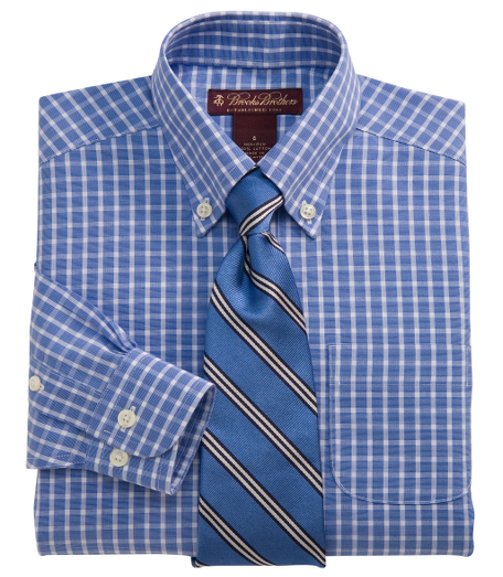 Cotton. Specially treated to resist wrinkles. Polo button-down collar. Long sleeve with barrel cuffs. Pucker-free seams. Machine wash. Imported.
