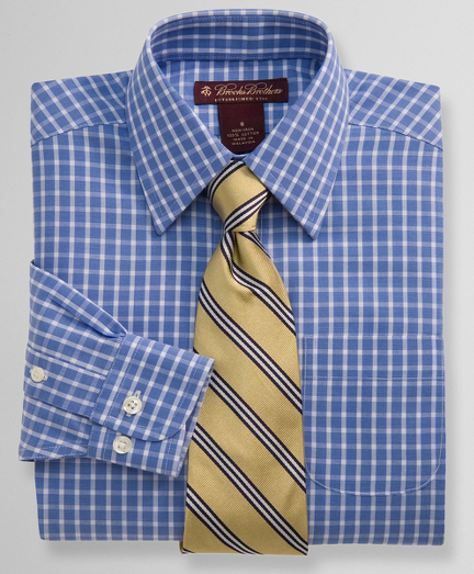 Cotton. Specially treated to resist wrinkles. Forward point collar. Long sleeve with barrel cuffs. Pucker-free seams. Machine wash. Imported.