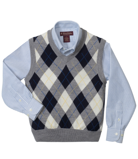 Merino. Fully fashioned. Ribbed neck. Dry clean. Imported.