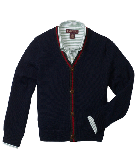 Merino. Striped rib neck. Fully fashioned. Genuine corozo buttons. Dry clean. Imported.