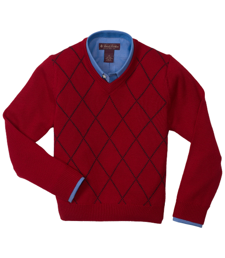 Merino. V-neck. Long sleeve with ribbed neck. Fully fashioned. Dry clean. Imported.
