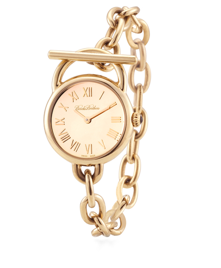 A uniquely feminine watch style that functions as a beautiful link bracelet as well as a precision timepiece. Gold mirrored dial and gold-plated links. Swiss movement. Anti-reflection glass. A semi-precious blue agate stone adorns the crown. Gold-plated stainless steel round case measures 1.18" diameter. Toggle bar closure. Links can be removed by a jeweler or watch repair. 8.25". Imported.