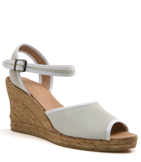 Suede. White leather trim. 4" heel. Imported.