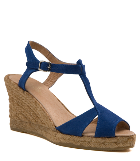 Suede. Leather lined. 4" heel. Silver hardware. Imported.