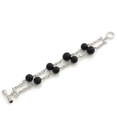Double row black resin beaded bracelet on silver-plated base metal. Toggle closure. 7.5" long. Imported. Presented in a beautiful gift box.