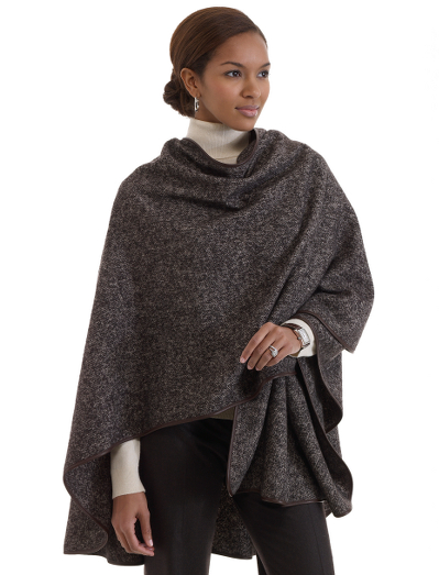 Wool/silk/angora/nylon with leather trim. 55" x  28". Dry clean. Imported.