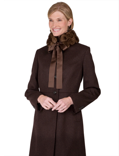 Mink with rabbit lining. Two rows of mink rosettes on a satin tie. 41" long x 4" wide. Dry clean. Imported.