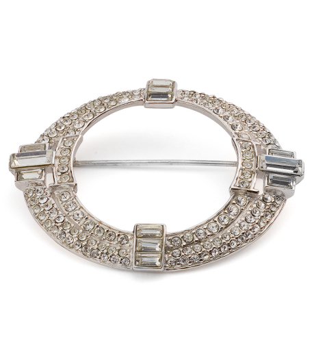 Deco inspired sterling silver and Austrian crystal  circle pin. Rhodium plated with a clear protective layer that resists tarnishing. Imported. Presented in a gift box.