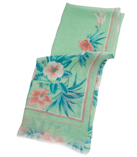 Bright colored linen wrap with all over floral design. 28" x 71". Dry clean. Made in Italy.