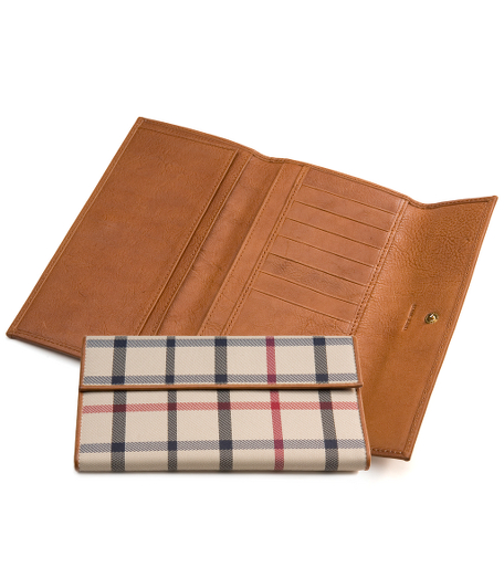 Polytattersall and leather. Gold metal hardware. Lined with grey/black moire. Interior pockets. 7 1/8" x 3 3/4" x 1". Imported.