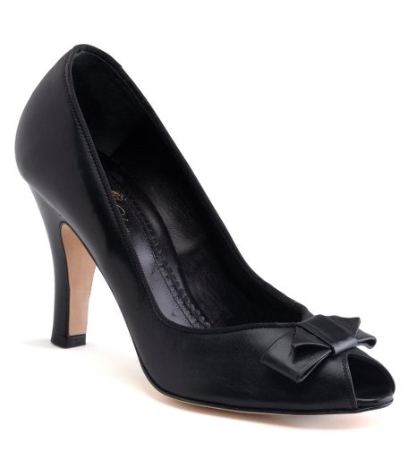Calfskin. Leather lining and sole. 3 1/2" stacked heel. Made in Italy.