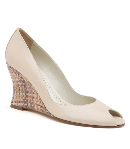 Leather. Leather lining and sole. 3 1/4" stacked heel. Made in Italy.