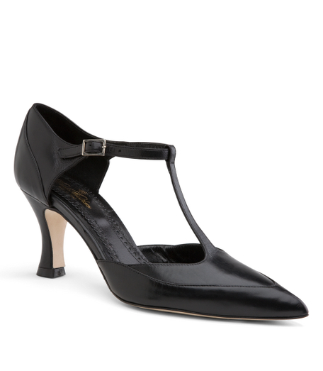 Leather. Leather lining and sole. 3 1/4" stacked heel. Silver hardware. Made in Italy.