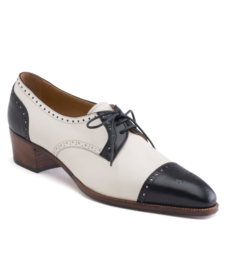 Leather. Leather lining and sole. 1 3/4" heel. Made in Italy.